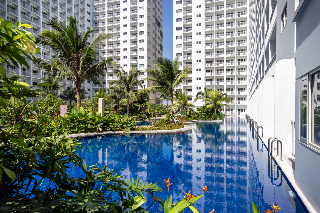 Pool and landscaped grounds at Shore Residences